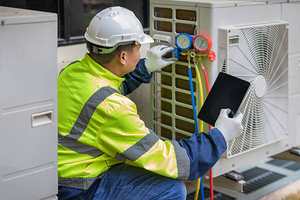 Professional Air Conditioning Repair technician working in Wellington, AL